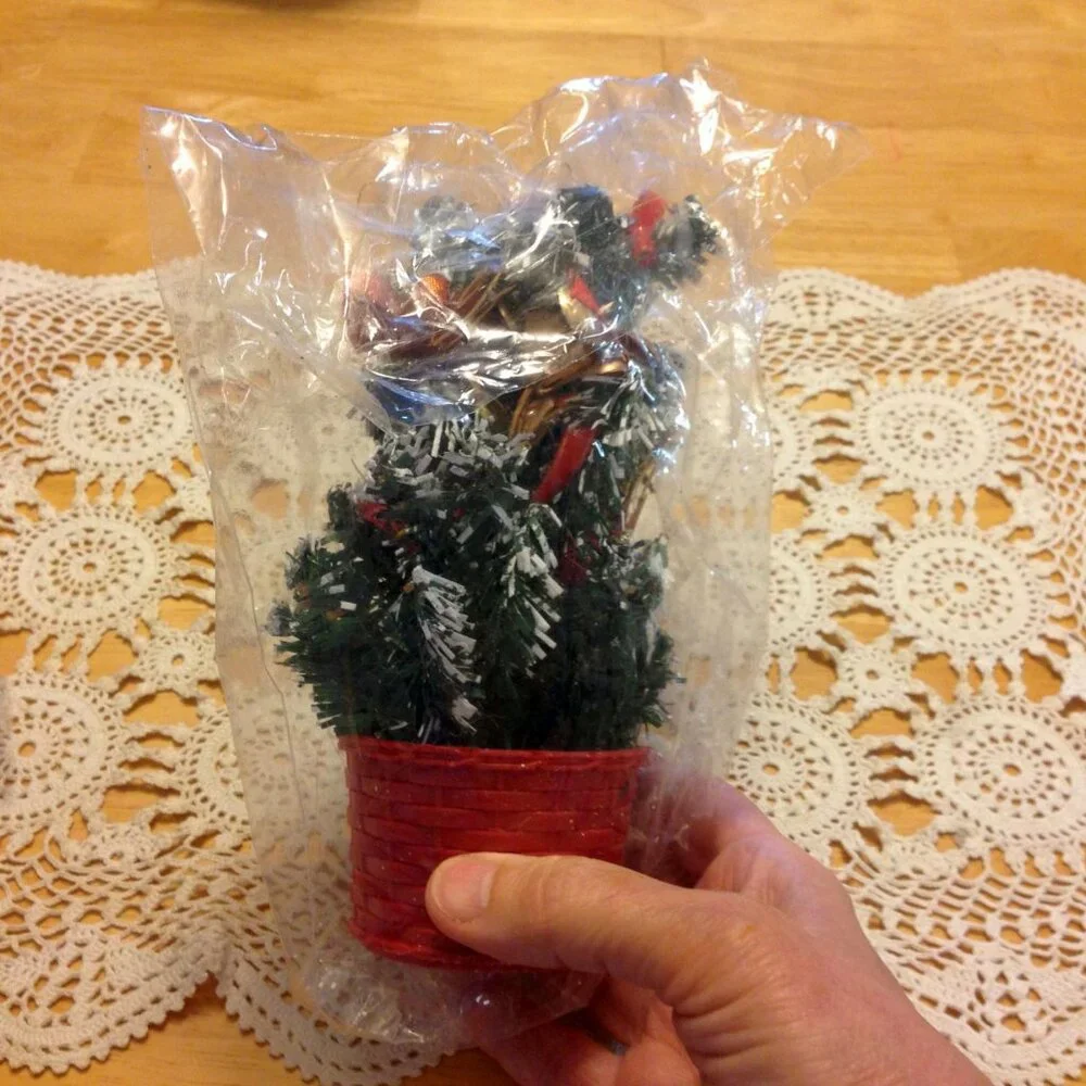 Holiday napkin rings and mini tree with presents